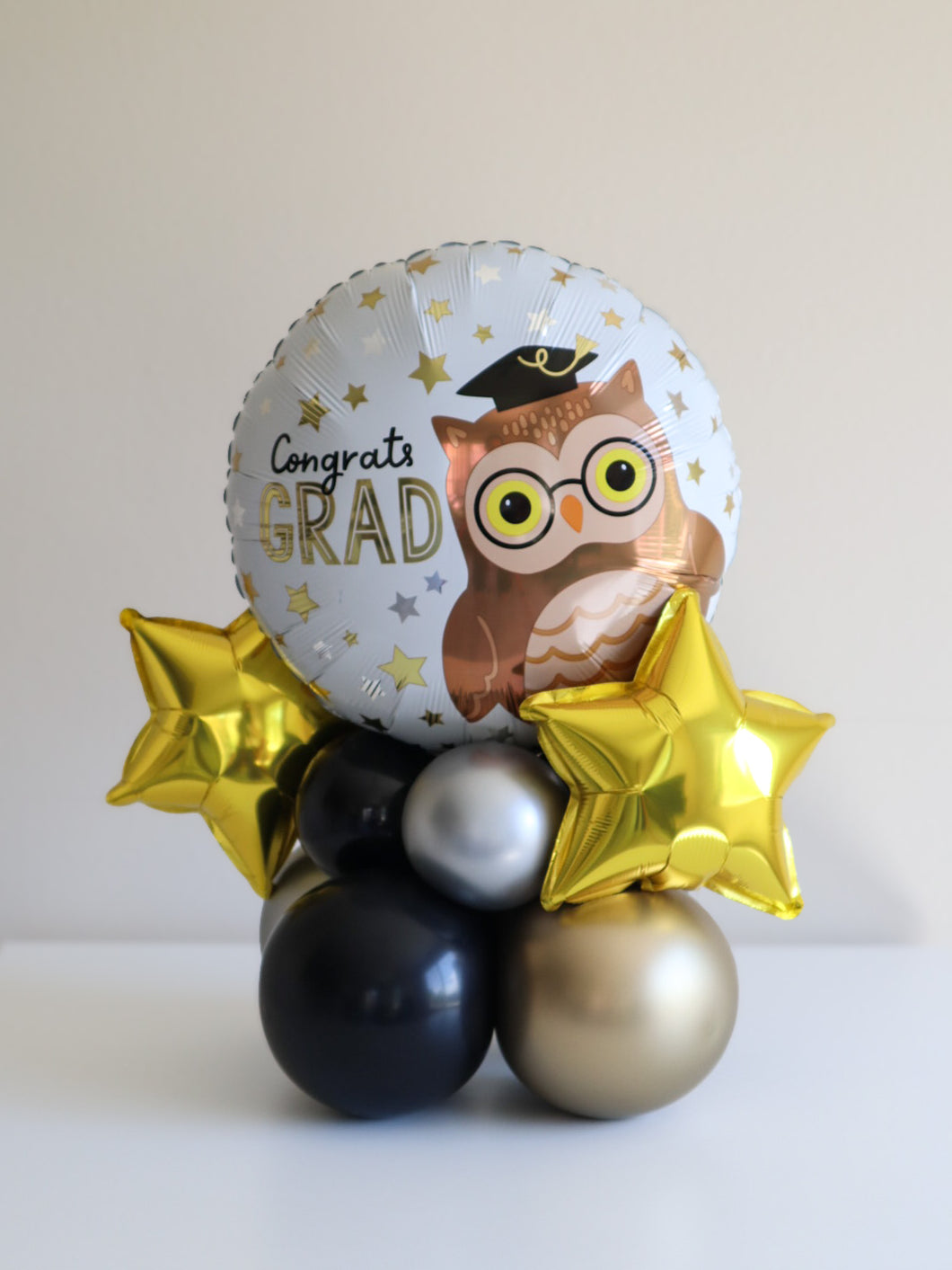 Congrats Grad Foil Balloon Stack – Air-Filled Centerpiece in Black, Gold & Silver
